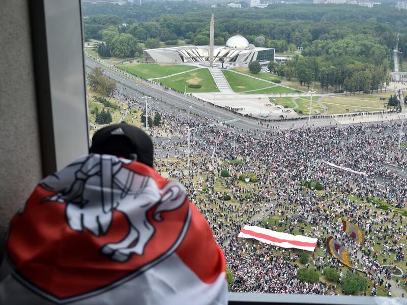 Opposition supporters rally to protest against disputed presidential elections results in Minsk on August 23, 2020. Tens of thousands of demonstrators massed in central Minsk on August 23 to demand the resignation of Belarusian President Alexander Lukashenko, the latest in a wave of protests against his disputed re-election. Sergei GAPON / AFP