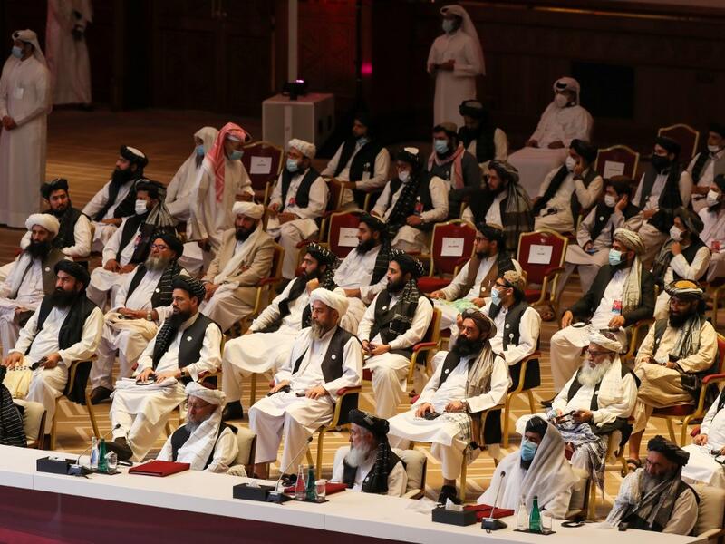 Members of the Taliban delegation attend the opening session of the peace talks between the Afghan government and the Taliban in the Qatari capital Doha on September 12, 2020. KARIM JAAFAR / AFP