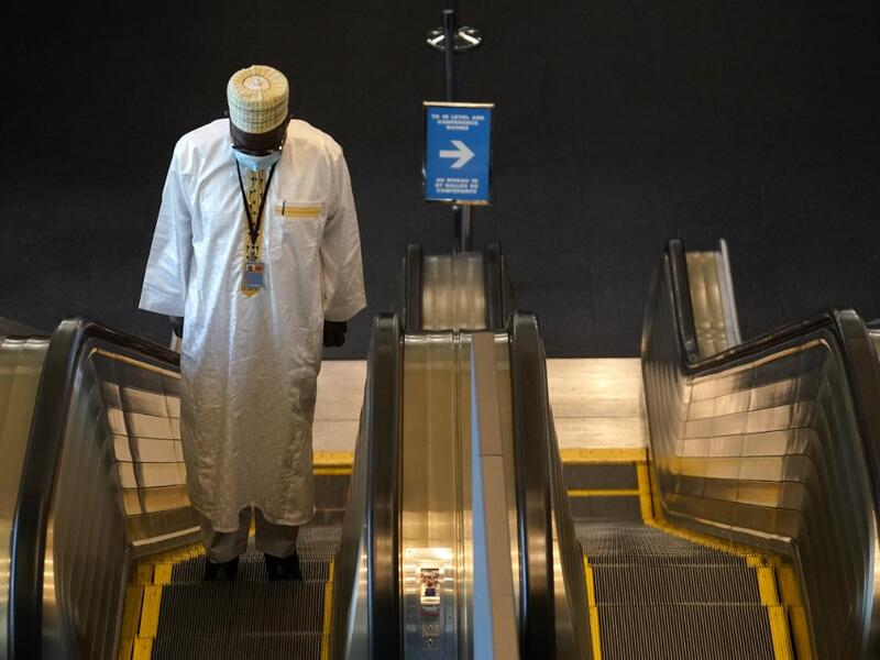 A delegate arrives at the United Nations September 22, 2020 for the 75th General Assembly of the United Nations which is mostly virtual due to the covid-19 pandemic in New York. UN Secretary-General Antonio Guterres urged the world to prevent a Cold War between the United States and China and halt conflicts so it can focus on the covid-19 pandemic. TIMOTHY A. CLARY / AFP