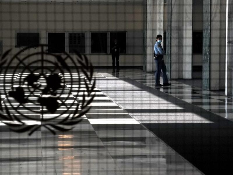 A UN police officer stands at an empty entrance at the United Nations September 22, 2020 during the 75th General Assembly of the United Nations which is mostly virtual due to the covid-19 pandemic in New York. UN Secretary-General Antonio Guterres urged the world to prevent a Cold War between the United States and China and halt conflicts so it can focus on the covid-19 pandemic. TIMOTHY A. CLARY / AFP