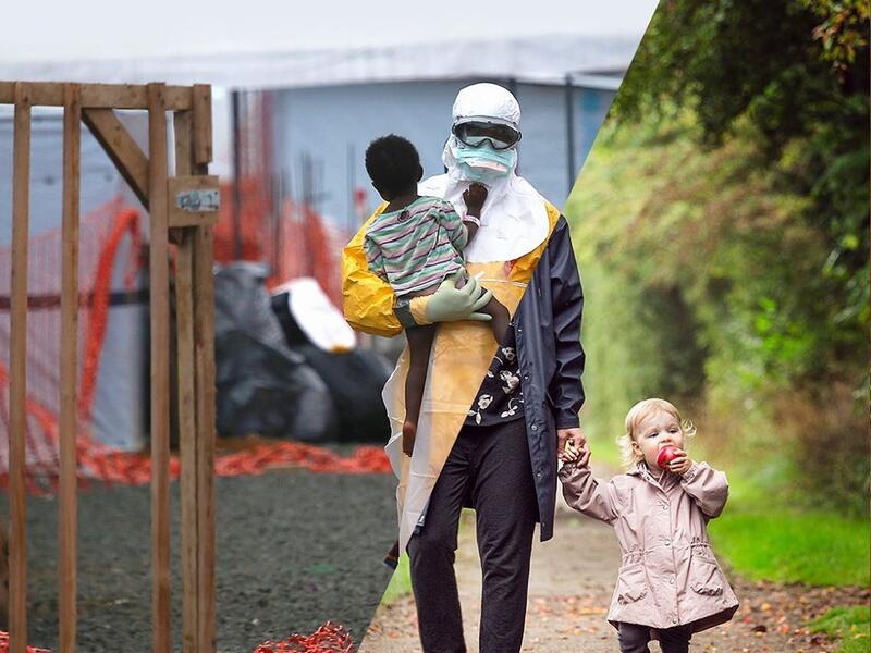 A Doctors Without Borders (MSF), health worker in protective clothing carries a child suspected of having Ebola in the MSF treatment center on October 5, 2014 in Paynesville, Liberia. The girl and her mother, showing symptoms of the deadly disease, were awaiting test results for the virus. The Ebola epidemic has killed more than 3,400 people in West Africa, according to the World Health Organization.  (ugurgallen/ Instagram)
