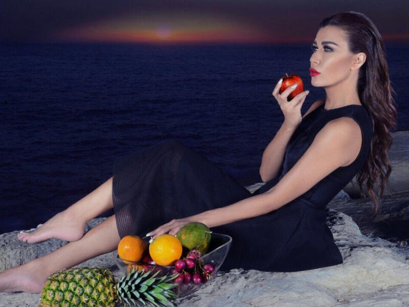 Nadine El Rassi Puts Her Troubles Behind and Celebrates Her Birthday in a Bikini and a Multi-Tier Cake