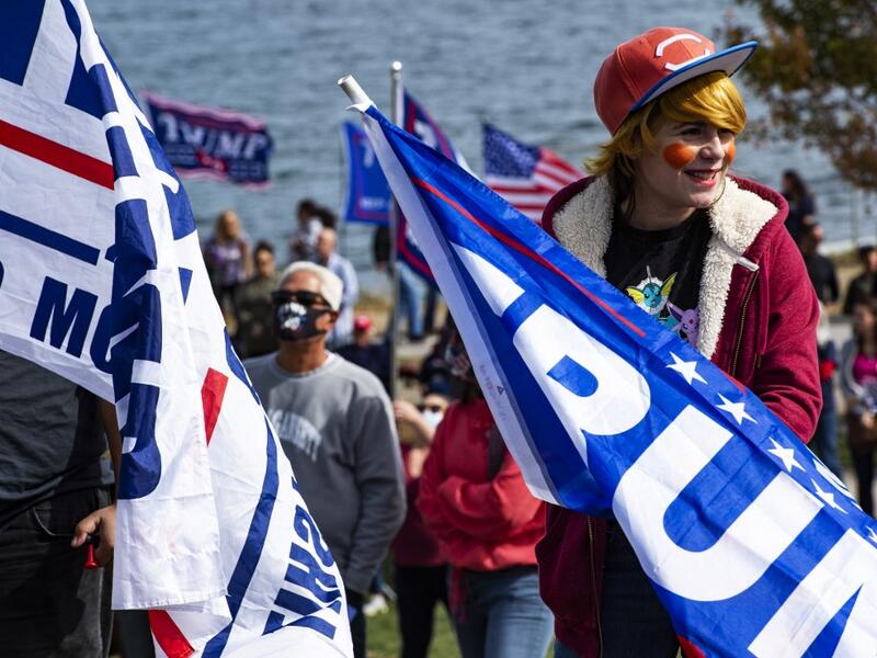 A contestant dressed as a Donald Trump Pokemon trainer participates in a Trump campaign rally named "Trumptoberfest" at Rocky Point Park in Warwick, Rhode Island on October 11, 2020. Many supporters dressed in political campaign clothing and waved flags while others dressed in festive costumes to take part in a political costume contest. Joseph Prezioso / AFP