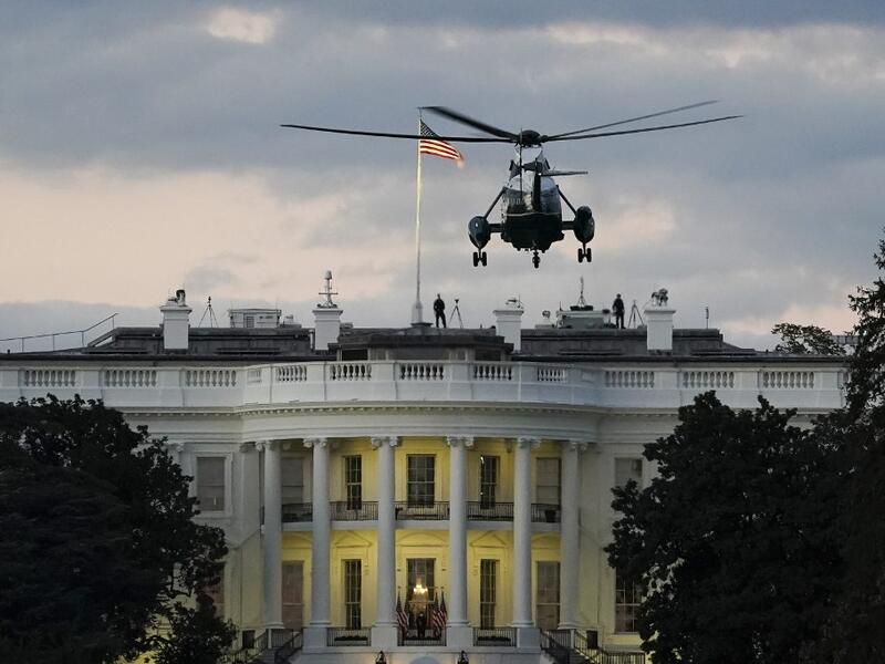 U.S. Marine One, with President Donald Trump onboard, prepares to land on the South Lawn of the White House on October 5, 2020 in Washington, DC. Trump was returning to the White House after being treated for Covid-19 at Walter Reed National Military Medical Center. Drew Angerer/Getty Images/AFP Drew Angerer / GETTY IMAGES NORTH AMERICA / Getty Images via AFP