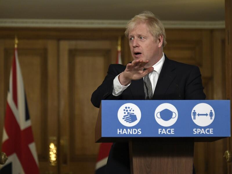 UK Prime Minister Boris Johnson on Saturday announced a new four-week coronavirus lockdown across England, a dramatic strategy shift following warnings hospitals would become overwhelmed under his current system of localised restrictions. Alberto Pezzali / POOL / AFP
