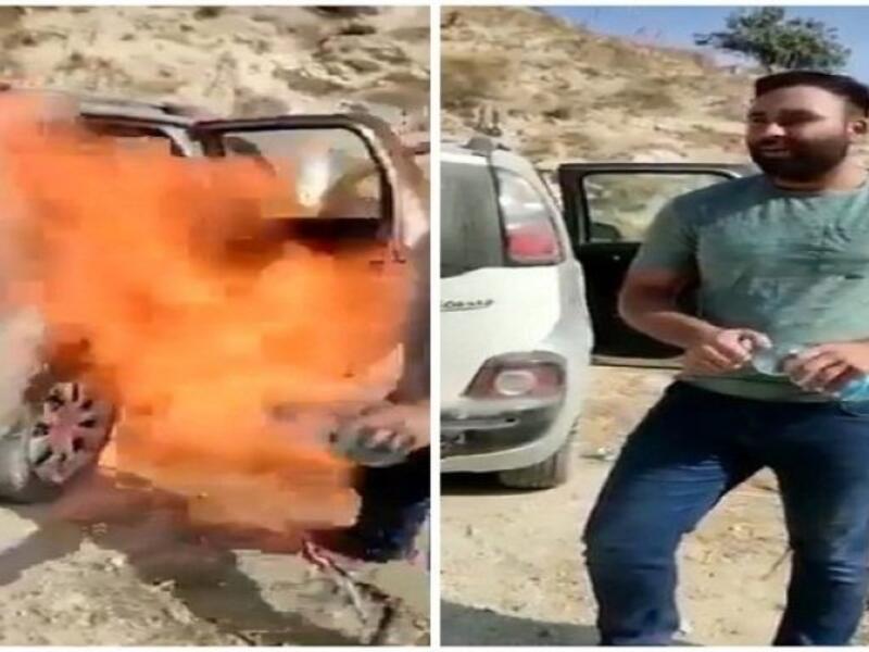 فلسطيني يحرق سيارته الفرنسية