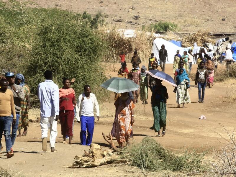 Ethiopian refugees who fled the fighting in Tigray Region are pictured at Umm Rakuba camp in eastern Sudan's Gedaref State, on November 30, 2020. ASHRAF SHAZLY / AFP