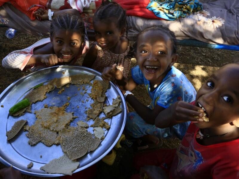 Ethiopia refugees who fled the fighting in Tigray Region are pictured at Umm Rakuba camp in eastern Sudan's Gedaref State, on November 30, 2020. ASHRAF SHAZLY / AFP