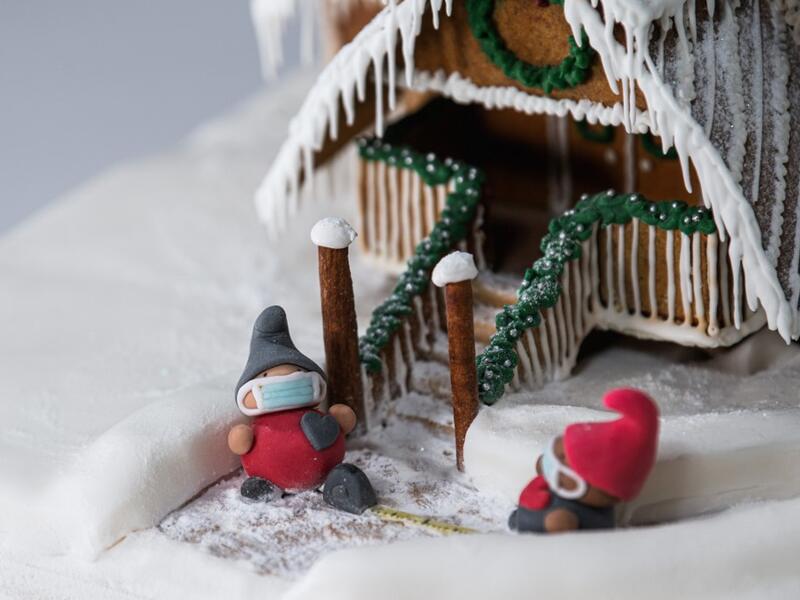 While members of the public would usually come to visit the exhibition in the Swedish capital, due the the Covid-19 pandemic, the gingerbread houses are stored at the museum and fans can visit ArkDes's website to view the entries, which include models of Sweden's state epidemiologist Anders Tegnell, climate activist Greta Thunberg, gnomes wearing surgical masks and families making the video calls that have become a more common way to stay in touch since the pandemic's start.  Jonathan NACKSTRAND / AFP