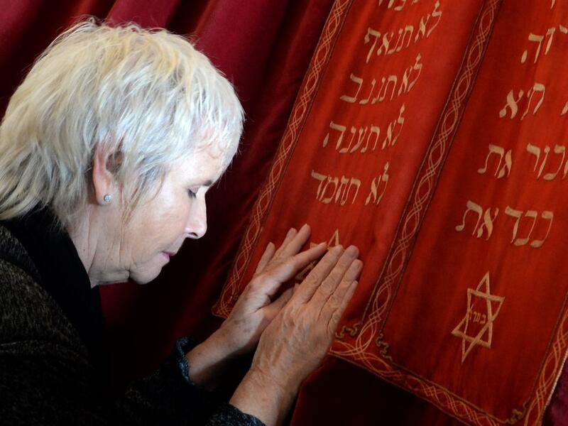  In this file photo taken on March 6, 2015, Fanny Mergui, a Moroccan Jewish woman, meditates as she visits Casablanca's Moroccan Jewish museum. Jewish history and culture in Morocco will now be part of the school curriculum -- a "first" in the region and in the North African country, where Islam is the state religion. Morocco's Jewish community has been present since antiquity and grew over the centuries, particularly with the arrival of Jews expelled from Spain by the Catholic kings after 1492. Fadel SENNA