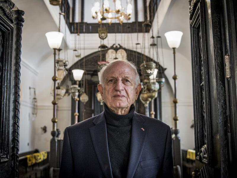 In this file photo taken on December 14, 2019, Andre Azoulay, adviser to the Moroccan king, poses for a picture at the "Bayt Dakira" (House of Memory) Jewish museum, in Morocco's Atlantic coastal city of Essaouira on December 14, 2019. Jewish history and culture in Morocco will now be part of the school curriculum -- a "first" in the region and in the North African country, where Islam is the state religion. Morocco's Jewish community has been present since antiquity and grew over the centuries, particularl