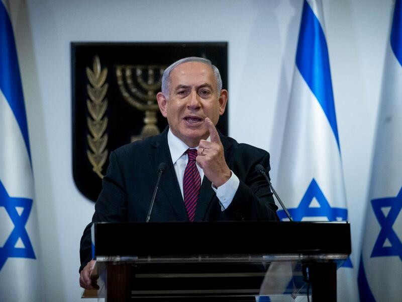 Israeli Prime Minister Benjamin Netanyahu delivers a speech at the Knesset (Israeli Parliament) in Jerusalem on December 22, 2020. Yonathan SINDEL / POOL / AFP