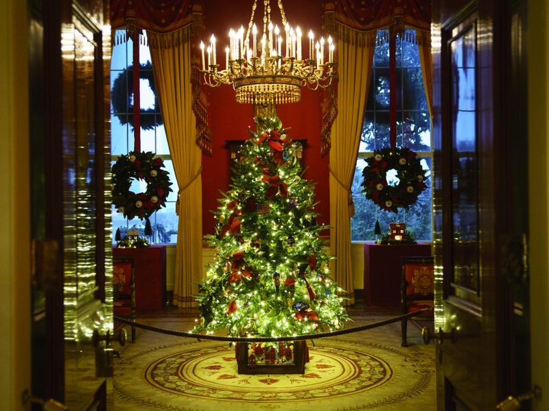  A Christmas tree and decorations are on display in the Red Room of the White House on November 30, 2020 in Washington, DC. This year's theme for the White House Christmas decorations is "America the Beautiful." Drew Angerer/Getty Images/AFP