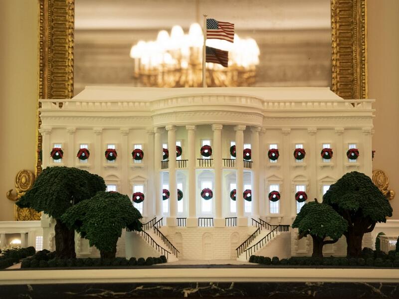  White House gingerbread house is displayed in the State Dining Room of the White House on November 30, 2020 in Washington, DC. This year's theme for the White House Christmas decorations is "America the Beautiful." Drew Angerer/Getty Images/AFP