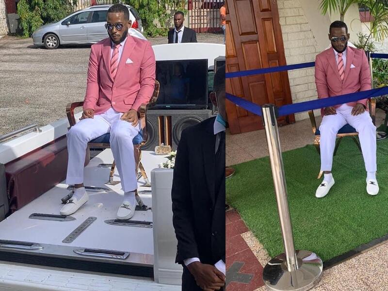Che's body was filmed sitting outside the church next to a large photo of him. (Twitter)