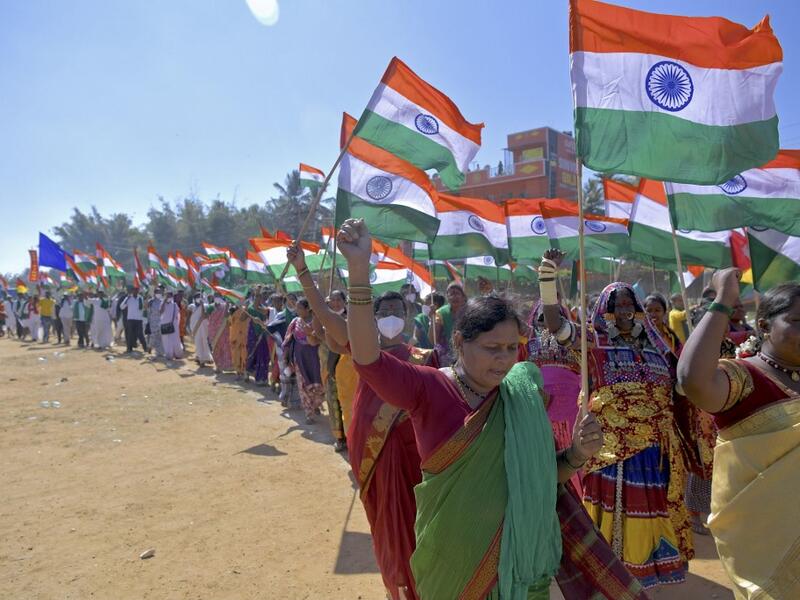 Activists and farmers take part in a protest as they continue to demonstrate against the central government's recent agricultural reforms, in Bangalore on January 26, 2021. Manjunath Kiran / AFP