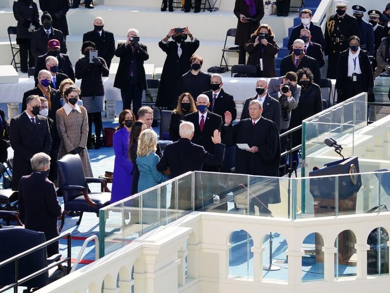 John Roberts, chief justice of the U.S. Supreme Court, center right, administers the oath of office to U..S. President-elect Joe Biden,during the inauguration on the West Front of the U.S. Capitol on January 20, 2021 in Washington, DC. During today's inauguration ceremony Joe Biden becomes the 46th president of the United States. Kevin Dietsch-Pool/Getty Images/AFP