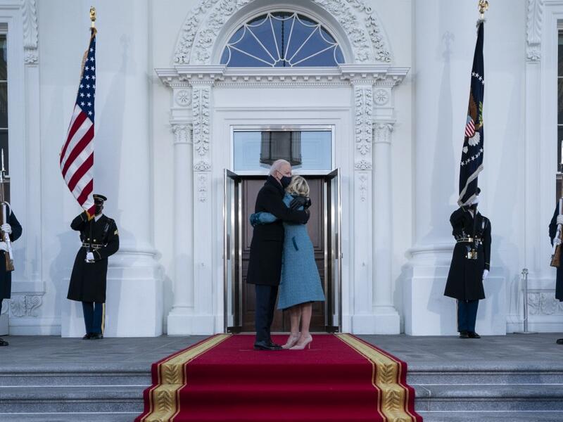President Joe Biden and first lady Dr. Jill Biden hug as they arrive at the North Portico of the White House, on January 20, 2021, in Washington, DC. During today's inauguration ceremony Joe Biden became the 46th president of the United States. Alex Brandon-Pool/Getty Images/AFP