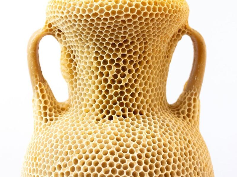 The Honeycomb Amphora I / 2020 “made by bees” series Materials: natural beeswax, museum glass, wood, re-used beehives (Instagram)