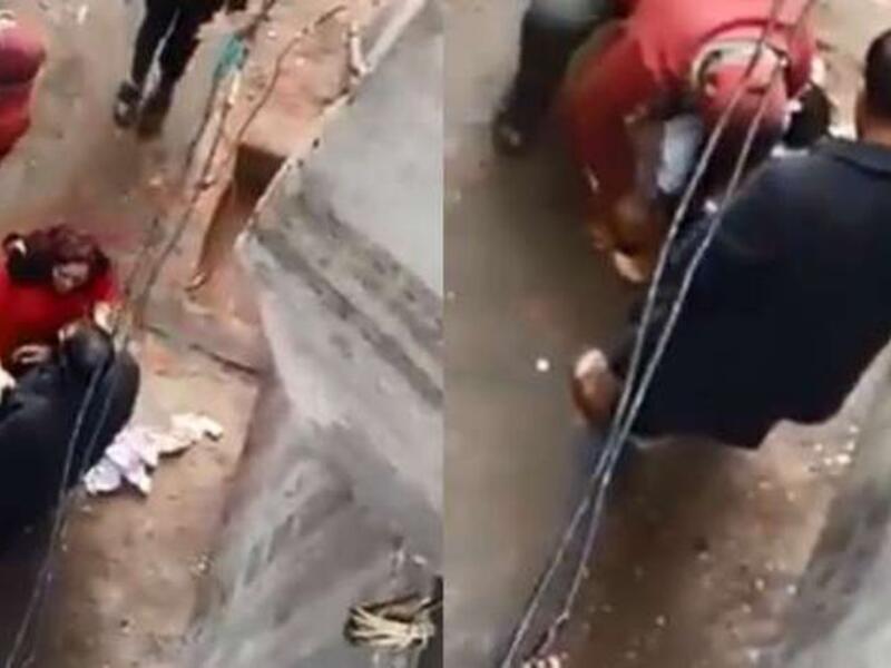 مصري يجرد رضيعته من ملابسها في الشارع ويحاول حرقها 