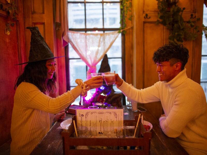People celebrate Valentine's day at Magical pub The Cauldron in New York on February 13, 2021. New York Restaurants reopened on Friday Indoor dining at 25% capacity for Valentine's weekend. Kena Betancur / AFP