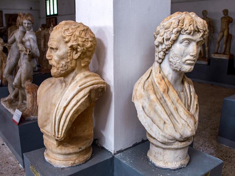 a view of busts from the Temple of Apollo on display at the Cyrene Museum which houses Greco-Roman artefacts