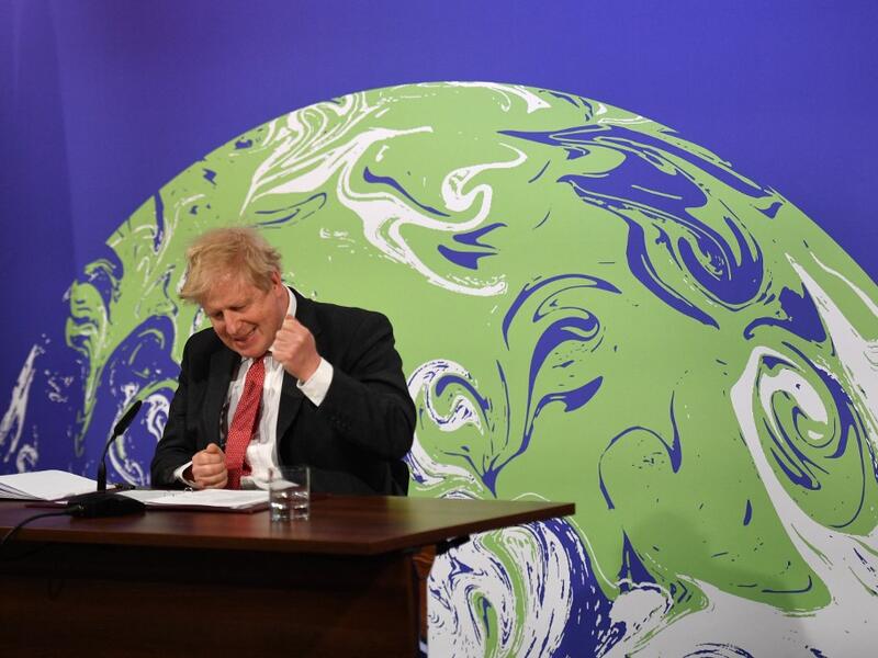 Britain's Prime Minister Boris Johnson speaks during the opening session of the virtual US Leaders’ Summit on Climate from the Downing Street Briefing Room in central London 