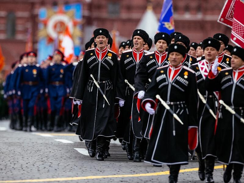 Cossacks march along Red Square during the Victory Day military parade in Moscow on May 9, 2021. Russia celebrates the 76th anniversary of the victory over Nazi Germany during World War II