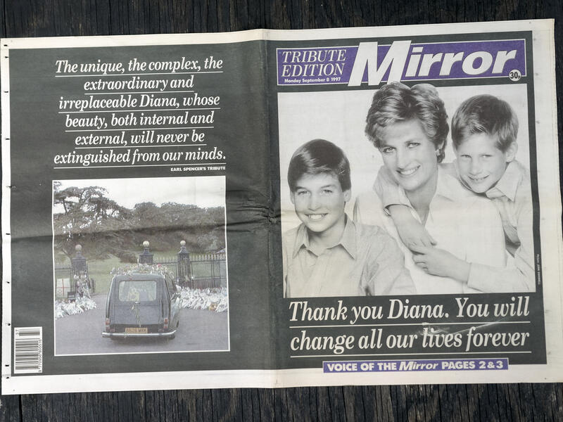 Mirror cover with Princess Diana, Prince William, and Prince Harry photograph