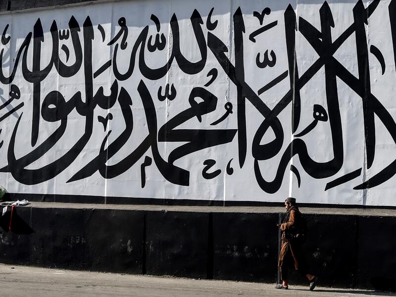 an Afghan journalist was attacked by the Taliban for interviewing a woman