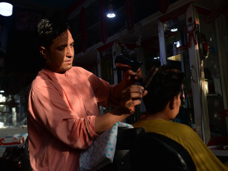 Since the Taliban swept to power in mid-August, Afghans have little cash to spare and fear being punished for sporting short or fashionable cuts. 