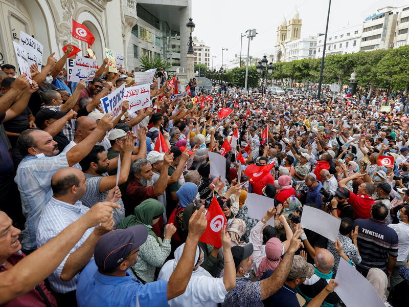 Thousands of demonstrators gather in Tunisian capital Tunis to protest against President Kais Saied's seizure of governing powers in July