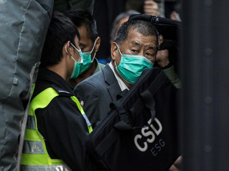 A Hong Kong court on Monday sentenced businessman and pro-democracy activist Jimmy Lai