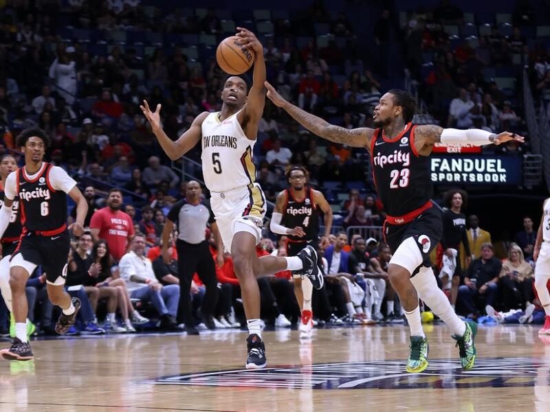 Herbert Jones #5 of the New Orleans Pelicans steals the ball from Ben McLemore #23 of the Portland Trail Blazers during the first half at the Smoothie King Center on April 07, 2022 in New Orleans, Louisiana.  (Photo by Jonathan Bachman / GETTY IMAGES NORTH AMERICA / Getty Images via AFP)