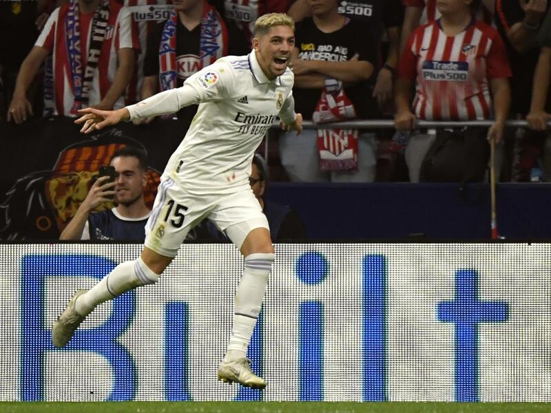 Real Madrid's Uruguayan midfielder Federico Valverde celebrates after scoring his team second goal during the Spanish League football match between Club Atletico de Madrid and Real Madrid CF at the Wanda Metropolitano stadium in Madrid on September 18, 2022. (Photo by OSCAR DEL POZO / AFP)