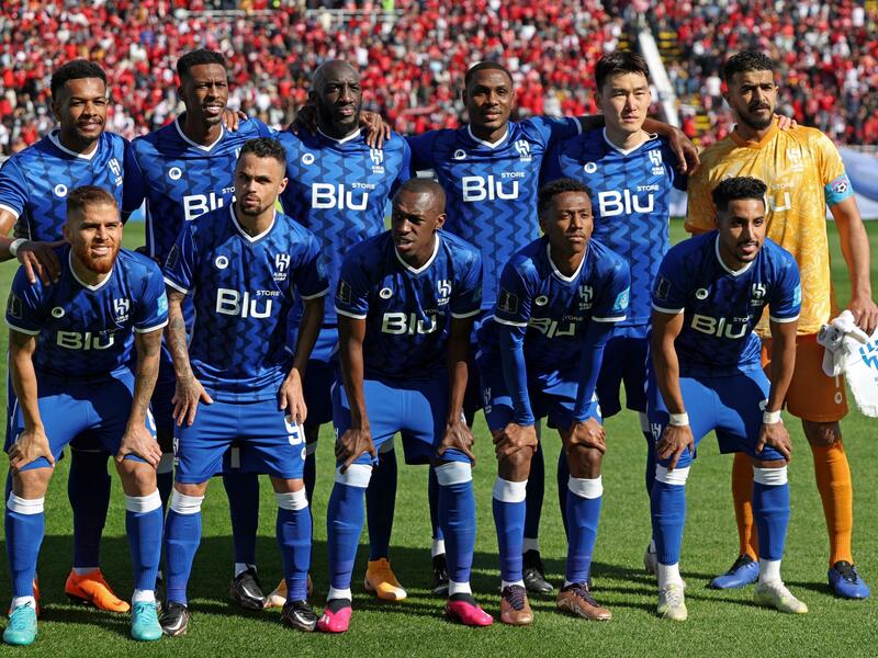 Hilal's players pose for a group picture ahead of the FIFA Club World Cup second round football match between Morocco's Wydad AC and Saudi Arabia's Al-Hilal at the Prince Moulay Abdellah Stadium in Rabat on February 4, 2023. (Photo by Fadel SENNA / AFP)