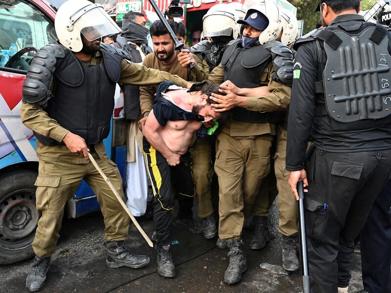 Pakistani police fired tear gas into Imran Khan’s home
