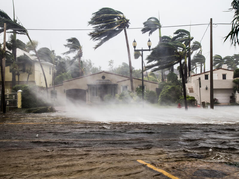 floods from heavy rainfall kill at least 129