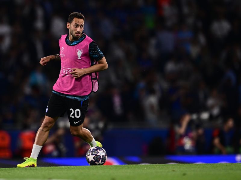 Inter Milan's Turkish midfielder #20 Hakan Calhanoglu warms up ahead of the UEFA Champions League final football match between Inter Milan and Manchester City at the Ataturk Olympic Stadium in Istanbul, on June 10, 2023. (Photo by Marco BERTORELLO / AFP)