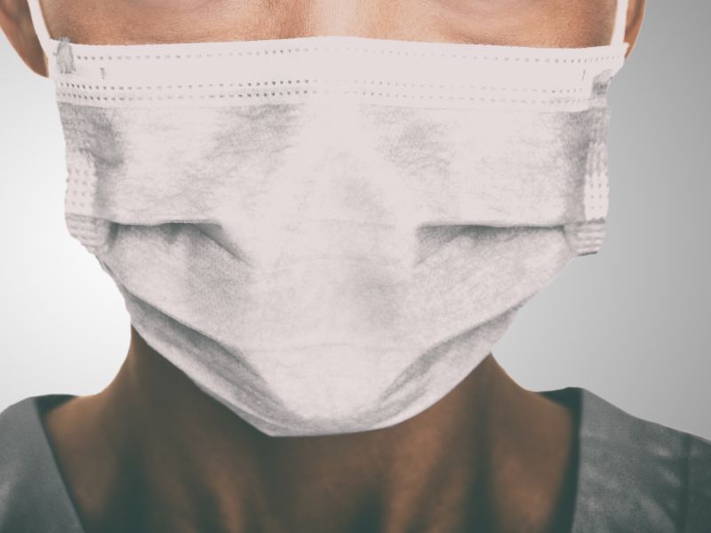 Doctor wearing protection face mask against coronavirus