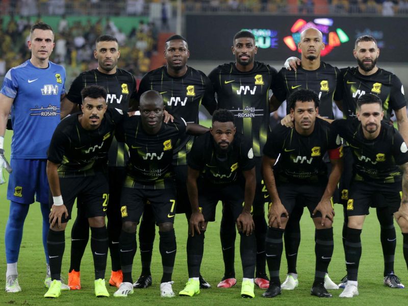 Ittihad's players pose for a group photo ahead of the Saudi Pro League football match between Al-Ittihad and Al-Tai at the Prince Abdullah al-Faisal Stadium in Jeddah on August 19, 2023. (Photo by AFP)
