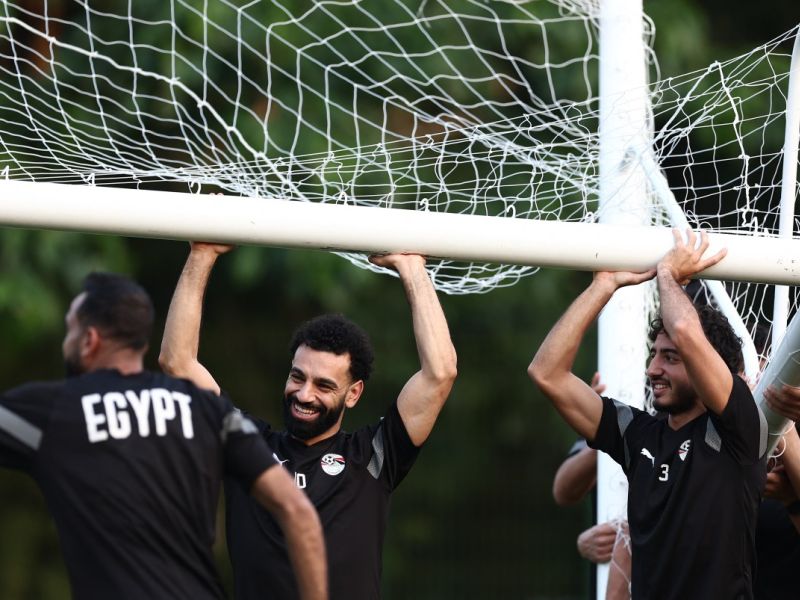 Egypt's forward #10 Mohamed Salah (L) jokes with teammates during a training session at Jardin Botanique stadium in Bingerville, Abidjan, on January 17, 2024, on the eve of the 2024 Africa Cup of Nations (CAN) football match between Egypt and Ghana. (Photo by FRANCK FIFE / AFP)