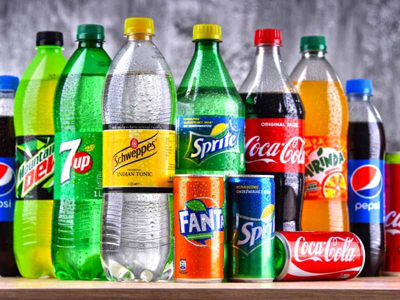 Bottles of global soft drink brands including products of Coca Cola