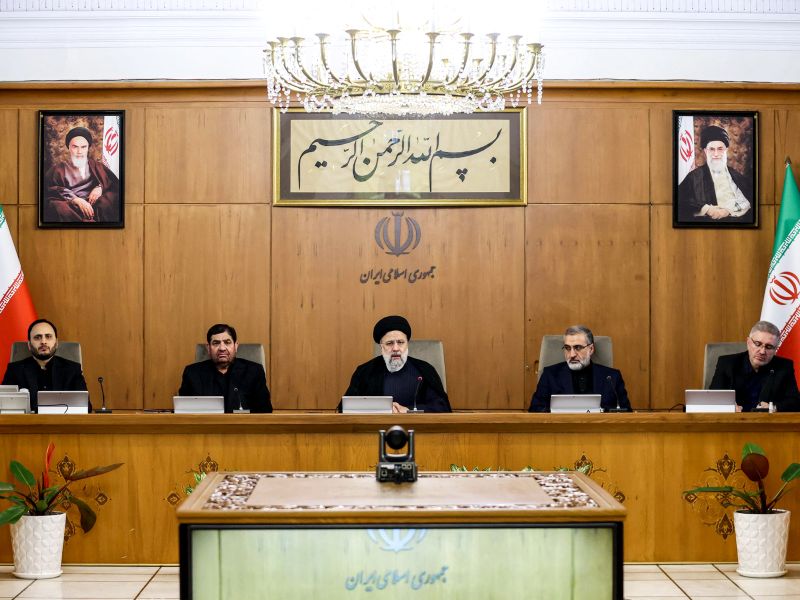 This handout picture provided by the Iranian president's office shows President Ebrahim Raisi (C) chairing a cabinet meeting in Tehran on April 2, 2024.