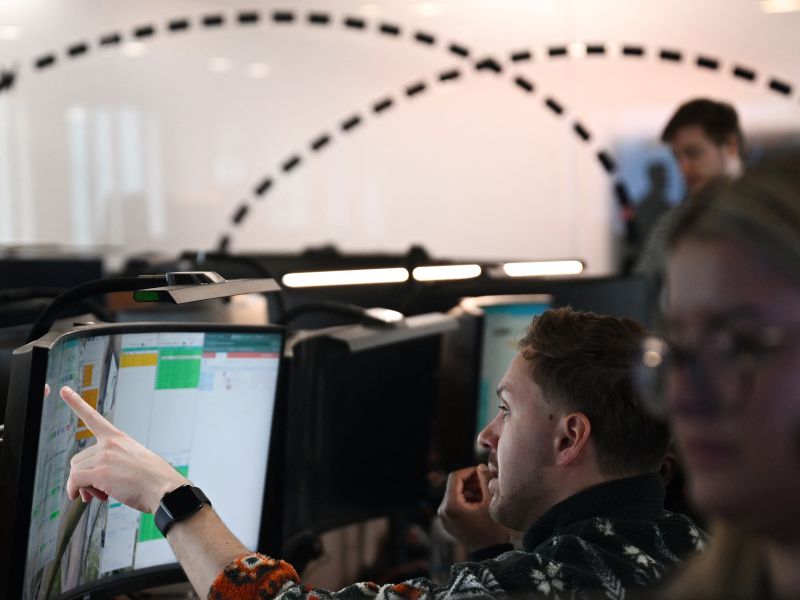 Members of staff work on computers in the Network Control Room inside Easyjet's new operations Integrated Control Centre (ICC) in Luton, north of London on May 22, 2024. A cutting-edge facility featuring artificial intelligence (AI) -- Easyjet's new control centre is tasked with handling about 2,000 mostly-European flights per day as the British airline eyes record summer demand. (Photo by Justin TALLIS / AFP)