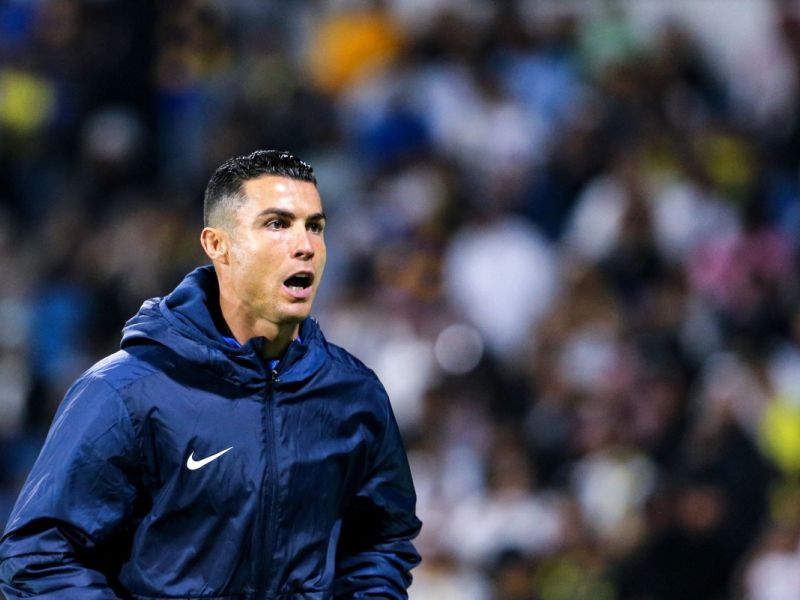Nassr's Portuguese forward #07 Cristiano Ronaldo reacts while warming up during the Saudi Pro League football match between Damac FC and Al-Nassr FC at Prince Sultan bin Abdulaziz Sports City stadium in Abha on April 5, 2024. (Photo by Mohammed ALSHEHRI / AFP)