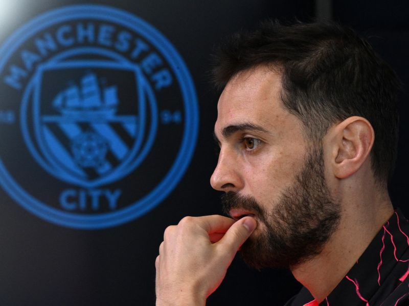 Manchester City's Portuguese midfielder #20 Bernardo Silva attends a press conference at Manchester City's training ground in north-west England on April 16, 2024, on the eve of their UEFA Champions League Group quarter-final second-leg football match against Real Madrid. (Photo by Oli SCARFF / AFP)