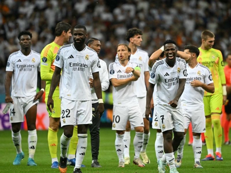 Real Madrid's players react after the UEFA Super Cup football match between Real Madrid and Atalanta BC in Warsaw, on August 14, 2024. (Photo by Sergei GAPON / AFP)