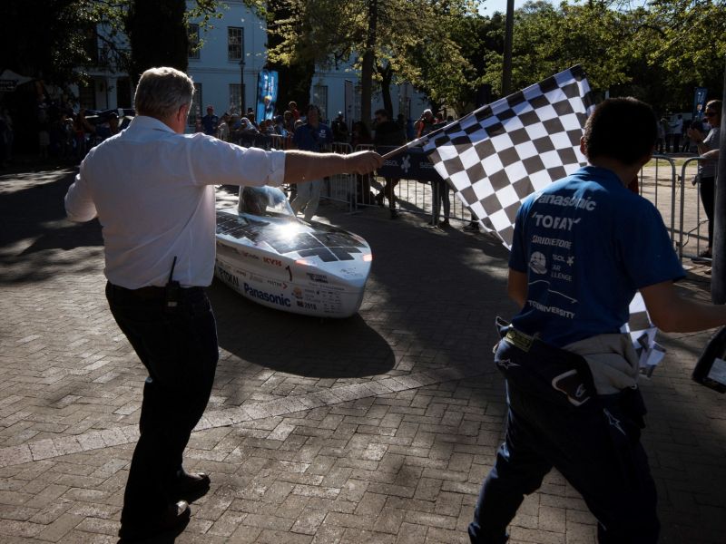 The eight-day race has South African and international solar-powered cars, vying to rack up as much distance as they can on roads and loops between Pretoria and Cape Town. (Photo by Rodger BOSCH / AFP)