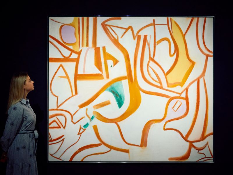 Art handlers hold a painting by Willem De Kooning 'Untitled XVIII', estimate: £4,000,000 6,000,000, from the collection of Eric Clapton during a photocall at Christie's auction house ahead of the 20th/21st Century Evening Sale in London, United Kingdom on October 03, 2024. (.photo by afp)